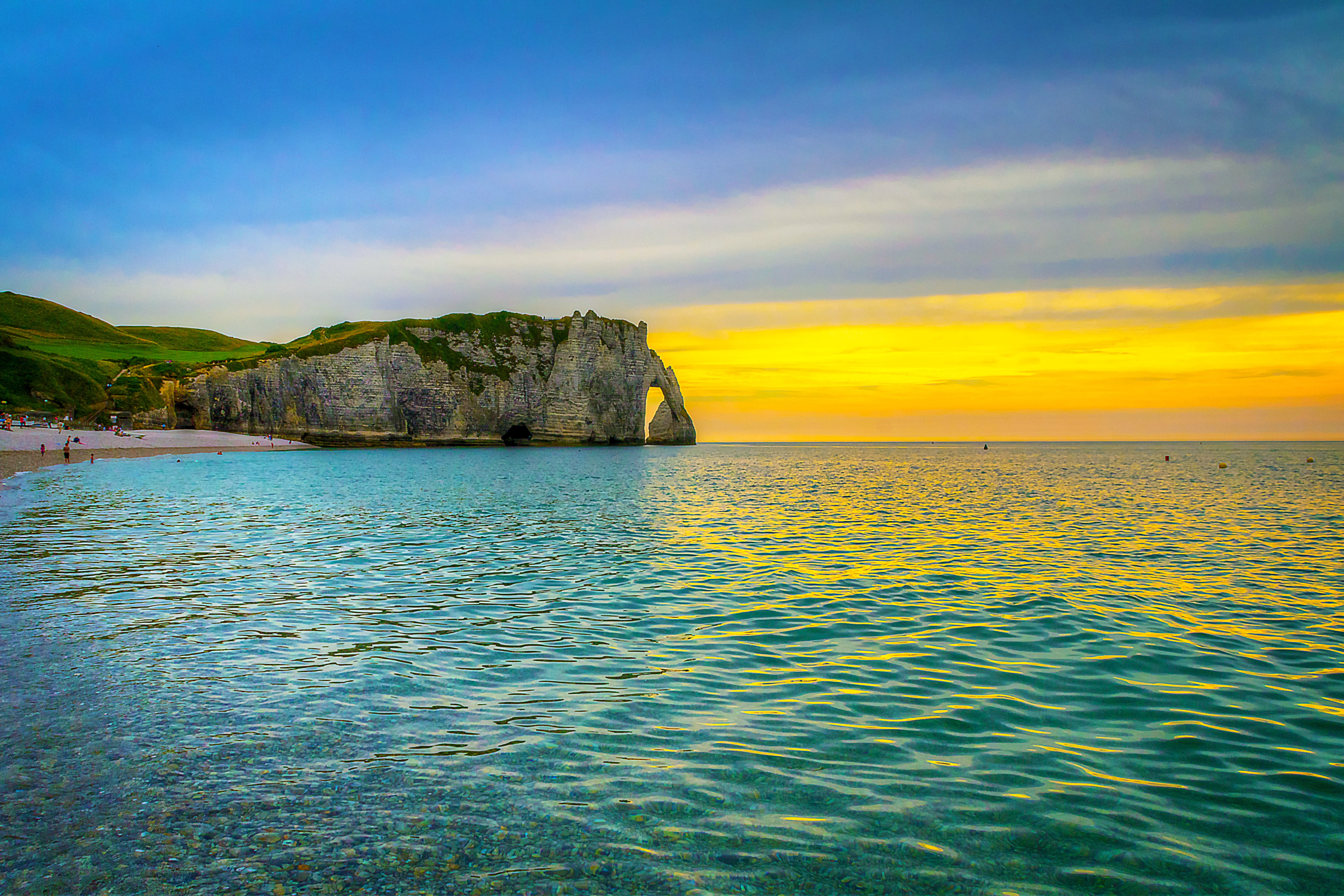 A serene calm ocean with gentle waves